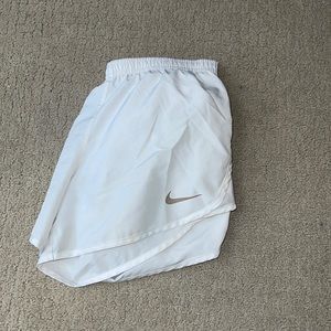 White Nike shorts